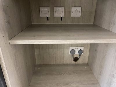 Accessible isolators and connections for kitchen appliances