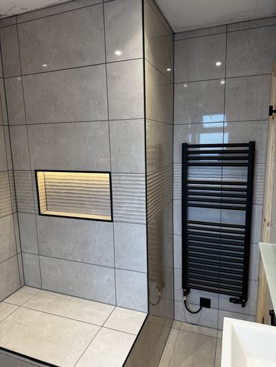 Ensuite shower alcove and towel radiator in Congleton