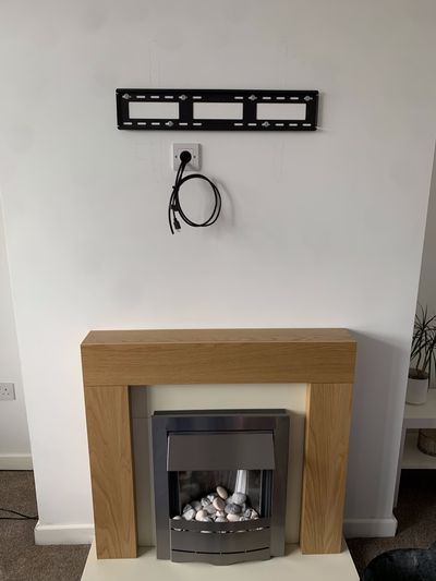 Wall mounted TV preparation and cabling